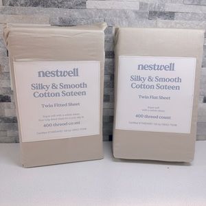 Brand new Nestwell oatmeal twin fitting and twin flat sheet. Super soft!